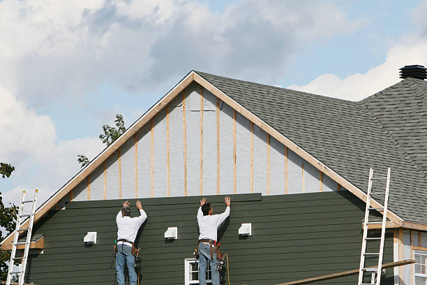 Professional Siding Repair technician working in Manchester, VA